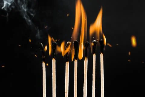 Burning matches in a row Stock Photos