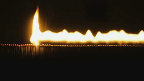 Burning matches in slowmotion on black background Stock Footage 86240350