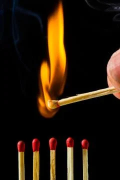 Burning matchstick Stock Photos
