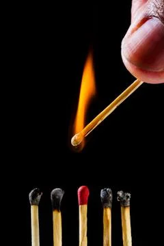 Burning matchstick Stock Photos