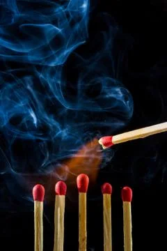 Burning matchstick Stock Photos