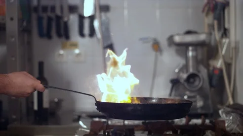 Burning meat in a frying pan Stock Footage 86468017