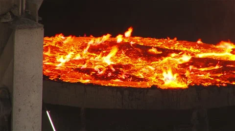 Burning metal vat Stock Footage 54946293