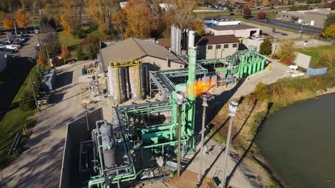 Burning off methane from a landfill, that can be used to generate electricity Stock Footage 305646104