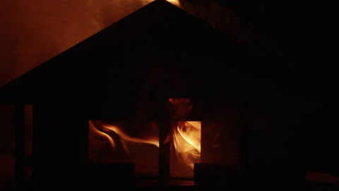 Burning model of a house. Building consumed by flames Stock Footage 293070065