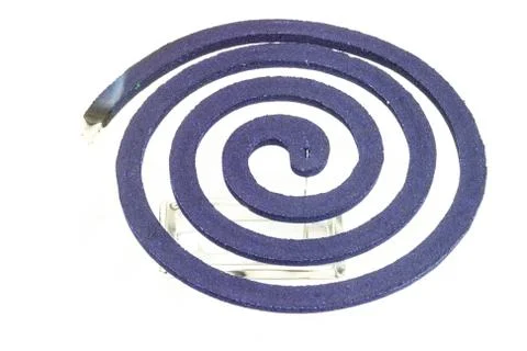 Burning mosquito coil. Stock Photos