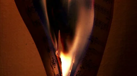 Burning music sheets Видео 10560811