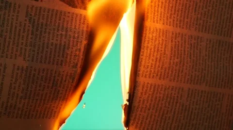 Burning newspaper opening another view chroma key  Видео 51671419