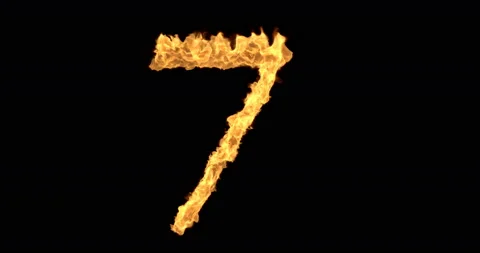 Burning number seven on a black background Stock Footage 138248060