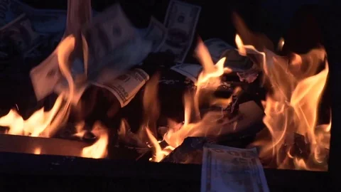 Burning one hundred dollar bill slow motion Video stock 79838392