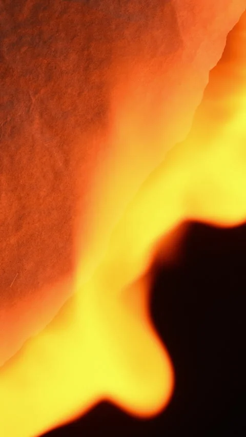 Burning paper with flame on dark background, vertical format Stock Footage 331943546