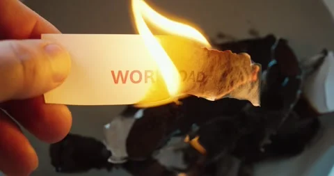 Burning Paper with Word Workload in Slow Motion Stock Footage 336356411