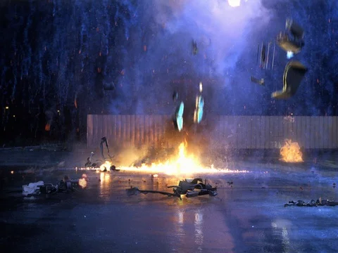 Burning Pieces Falling Around after an Explosion Stock Footage 72141810