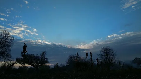 Burning pile of garbage at dump site toxic smoke rises into the air against Stock Footage 97304830