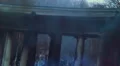 Burning pillars of building, columns in fire, smoke rising above HD Footage
