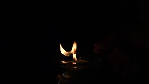 Burning pine needle resin in candle flame slow motion Stock Footage 229876152