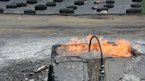 Burning pool for fire drill. Practice a fire drill outdoor 库存影片 155865157