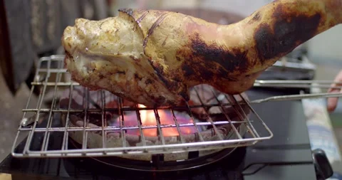 Burning the pork knuckle before cooking. Stock Footage 222582504