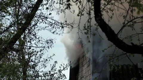 Burning private house during a big fire Stock Footage 239374688