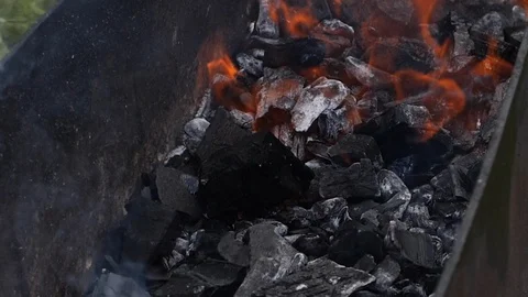 Burning process coals during the barbecue outdoors Video stock 123963916
