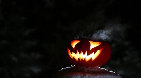 Burning pumpkin on Halloween. Looped Stock Footage