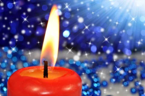 Burning red candle Stock Photos