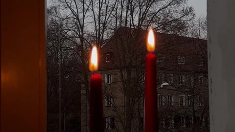 Burning red candles create a cozy atmosphere Stock Footage 304611425