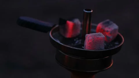 Burning red coals for hookah, hookah cooking at home, ashes, dark interiors Stock Footage 196861765