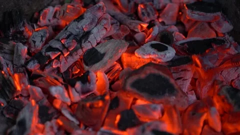 Burning red organic charcoal texture in bbq grill Stock Footage
