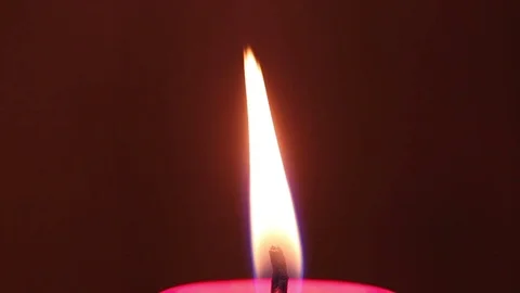 Burning red wax candle. macro shooting Stock Footage 81580469