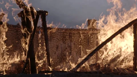 Burning remains of cabin 03 Stock Footage 165329431