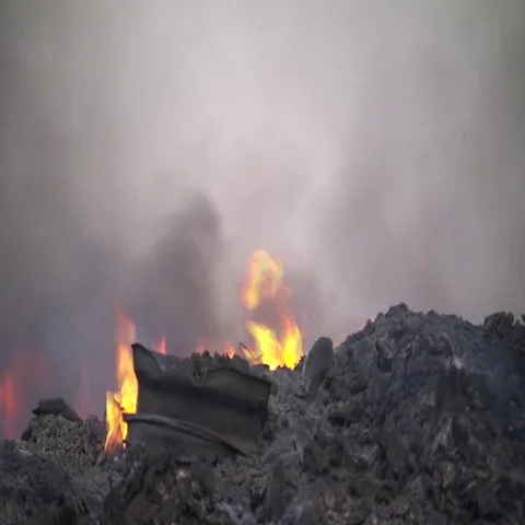 Burning rubber tires Stock Footage 69449265