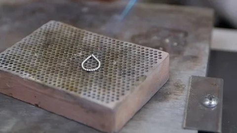 Burning silver in a jewelry Stock Footage 73498529