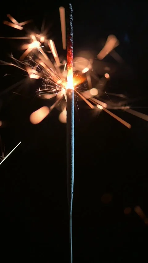 Burning sparkler on black background closeup Stock Footage 231400719