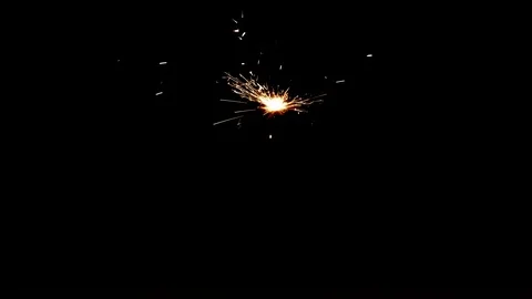 Burning sparkler on black background Video stock 113209358