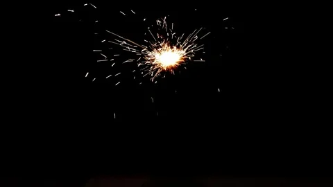 Burning sparkler on black background Stock Footage 113209661