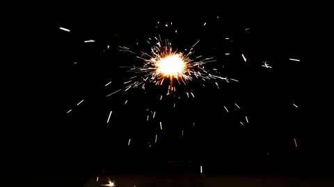 Burning sparkler on black background Video stock 113211009
