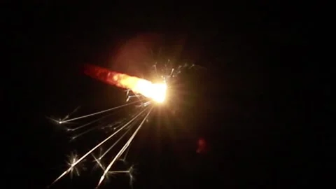 Burning Sparkler On Black Background Stock Footage 154913391