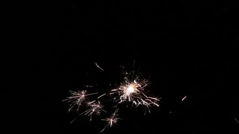 Burning sparkler on black background Stock Footage 168122278