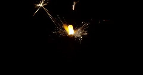 Burning sparkler isolated on black background with alpha channel. Celebration Stock Footage 147107504