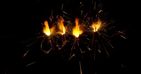 Burning sparkler isolated on black background with alpha channel. Celebration Stock Footage 147107565
