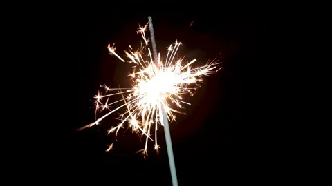 Burning sparkler isolated on black background. Stock Footage 149669059