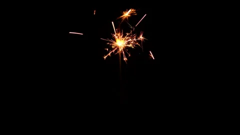 Burning sparkler isolated on black background Stock Footage 166025269