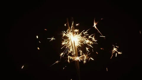 Burning sparklers on background Stock Footage 86510507