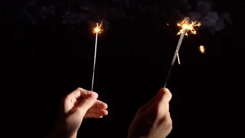 Burning sparklers in hand 動画素材 70917387
