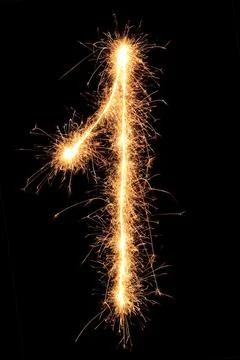 Burning Sparkling number 0 zero isolated on black background. Beautiful Glowing Stock Photos