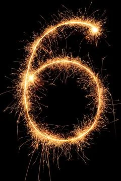 Burning Sparkling number 0 zero isolated on black background. Beautiful Glowing 写真素材