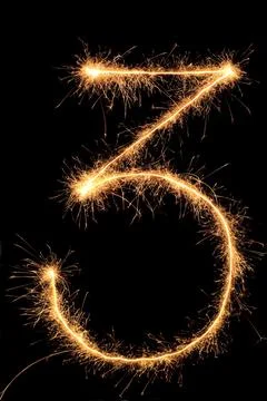 Burning Sparkling number 0 zero isolated on black background. Beautiful Glowing 스톡 사진