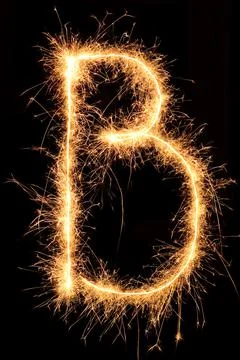 Burning Sparkling number 0 zero isolated on black background. Beautiful Glowing 写真素材