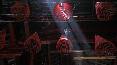 Burning spiral incense with dramatic lighting background Stock Footage 52113125